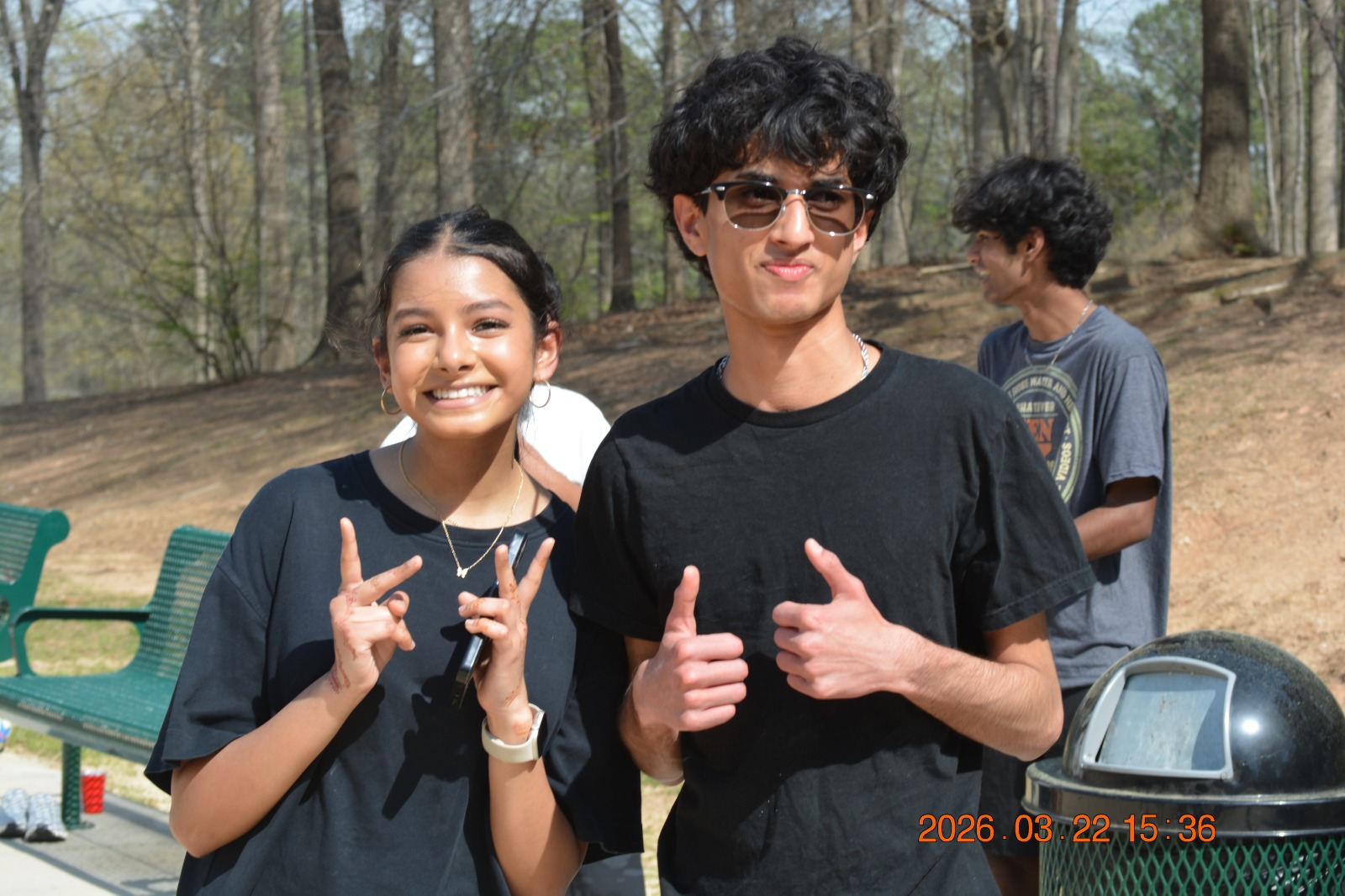 Two participants smiling and posing at a Capture Success meetup.